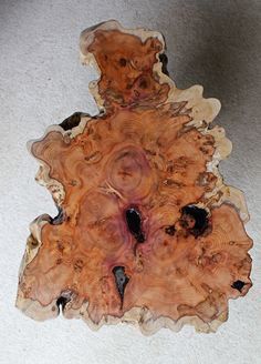 a piece of wood that has been cut into pieces and is sitting on the floor