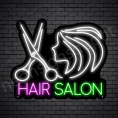 a neon sign that says hair salon on the side of a brick wall with scissors