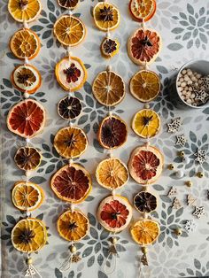 oranges and other fruits are arranged on a table