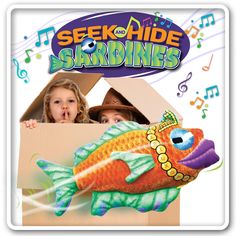 two children in a cardboard box with an image of a fish and music notes behind them