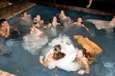 a group of people in a swimming pool