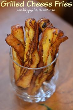 grilled cheese fries in a glass on a table