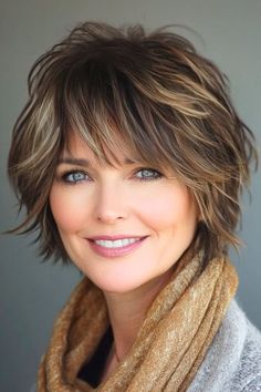 Save this pin for the best shag hairstyles for women over 50. This cropped shag brings a bold and energetic vibe with its shorter length and chunky layers. It’s a great option for anyone looking for a shag that’s full of movement without too much length. Layered Short To Medium Haircuts, Short Shag Fine Hair Over 50, Short Thick Straight Hairstyles, Boat Hair Hairstyles Medium, Flipped Out Bob Hairstyles, Hair Cuts For Thinner Hair Straight, Cropped Shag Haircut, Medium Wavy Haircuts For Women, 2025 Hair Styles