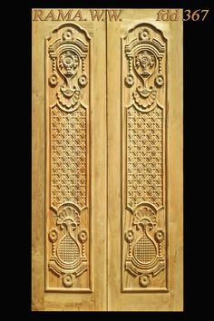 two wooden doors with carvings on them