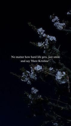 a black background with white flowers and a quote on the bottom right corner that reads, no matter how hard life gets, just smile and say