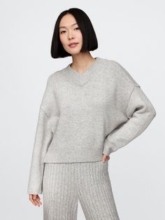 Supersoft cotton-blend sweater.  V-neck.  Long sleeves with drop shoulders.  Ribbed hem.  Fit: Over Grey V Neck Sweater Outfit, V Neck Sweater Outfit, Neck Sweater Outfit, Grey V Neck Sweater, Plush Yarn, Everyday Luxury, Christmas 2024, Toddler Gifts, V Neck Sweater