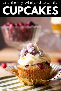 cranberry white chocolate cupcakes on a plate with the title above it