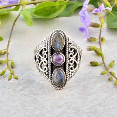 Labradorite and Amethyst Both Gemstone Ring, Triple Stone Ring, 925 Sterling Silver Ring, Vintage Labradorite Ring For Women, Handmade, boho Enjoy Free Shipping on All Orders Product Description:-  PRODUCT CODE     :-    SIZE           :-    All Size Are Available. Choose From Variation. METAL           :-    925 sterling Silver STONE                    :-    Labradorite, Amethyst STONE SHAPE        :-    Oval PURITY           :-    925  Ring can be customized on request and gemstone can be made to any gemstone you want. If You Need Faster Shipping, Please Contact us Please Make Sure to Include The Correct Address During Before Order. You Can return Item within 30 Days After Successful Delivery. We Offer 100% Money Back Guarantee If You Not Satisfied With Your Purchase. Return Charge Will Bohemian Oval Crystal Ring With Natural Stones, Oval Bohemian Crystal Ring With Natural Stones, Bohemian Oval Crystal Ring Nickel-free, Bohemian Oval Crystal Ring Nickel Free, Bohemian Style Oval Crystal Ring Nickel Free, Handmade Bohemian Gemstone Rings, Bohemian Labradorite Gemstones As Gifts, Bohemian Gemstones With Gemstone Accents, Bohemian Oval Multi-stone Rings