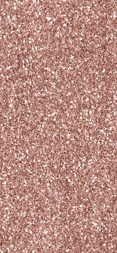 a pink glitter background with small white dots