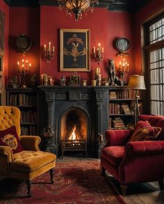 a living room filled with furniture and a fire place next to a book shelf full of books