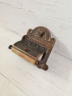 an old fashioned telephone sitting on top of a white wooden floor