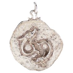 This stylish Sterling Silver Pisces Charm is the perfect accessory for the fashion-forward astrology enthusiast. Measuring 1 3/8 inches, this zodiac charm will add a touch of celestial charm to any jewelry collection. Wear it as a reminder of the sign's positive characteristics such as compassion, creativity, and intuition. Ideal for those born between February 19th and March 20th, this beautiful charm makes a great gift for yourself or the Pisces in your life. Length: 1 3/8 inch Width: 1 1/8 in Pisces Pendant, Positive Characteristics, March 20th, Gift For Yourself, Astrology, Jewelry Necklace Pendant, Fashion Forward, Jewelry Collection, Vintage Items