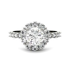 a diamond engagement ring with an oval center surrounded by round brilliant cut diamonds