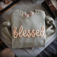 EMBROIDERED Sweatshirt THANKFUL Chenille YARN Sweatshirt Christian Gifts Custom Personalized Fall shirt Autumn Shirt Trendy Trending Gifts This listing is for blessed sweatshirt, similar to the first image. The other images are purely for example so show what we offer. We have other listings that include custom designs, as well as youth and toddler sizes. Check out our store. Because of the nature of this custom design, we recommend handwashing. Sweatshirts are Gildan Softstyle. These are Unisex Chain Stitch Sweatshirt, Embroidered Mom Sweatshirt, Christian Embroidered Sweatshirt, Embroidery Sweatshirt Ideas, Sweatshirt Embroidery Ideas, Trending Sweatshirts, Thankful Sweatshirt, Trendy Sweatshirts, Gifts For Tech Lovers