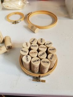 a bunch of wine corks sitting on top of a table next to other items