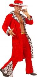 a man in a red suit and zebra print hat is talking on his cell phone