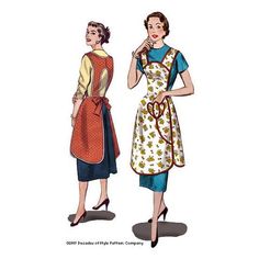 two women in aprons standing next to each other