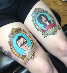 two people with tattoos on their legs, one is wearing a mustache and the other has a woman's face