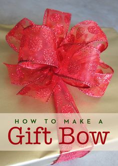 how to make a gift bow out of wrapping paper and ribbon with the words how to make a gift bow on it