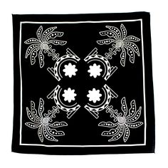 a black and white square scarf with four flowers on the center, surrounded by leaves