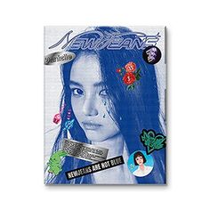 a magazine cover with an image of a woman's face and various stickers on it