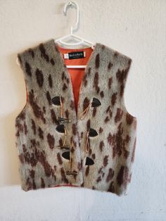 For Sale: Vintage 1970s Ninth Street East LTD Unisex Faux Fur Vest Very cool 1970s faux fur vest. Overall in great condition and ready to wear. It may be a men's size medium, but I'm not sure, it's definitely a unisex item. Please see photos for measurements.  Very cool item. The bottom clasp is missing one string is really the only flaw. Can probably be very easily fixed.  Very rare vest, and I can't find one exactly like it online. Gilet Fur, Mens Vests, Faux Fur Vest, Faux Fur Vests, Vest Outfits, Fur Vest, Cool Items, Western Outfits, Vintage 1970s