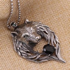 This Pendant Necklace has a Fenrir Wolf design on it. The Fenrir is a Wolf-Giant-god and considered one of the greatest enemies of the Aesir. He's destined to fight and kill Odin during Ragnarök. In Viking mythology, he was a symbol of strength, ferocity, destiny, and inevitability. This Pendant Necklace can create a strong amazing style that you ever have and can be worn by anyone, especially fashion lovers. Material: Stainless SteelSymbol: Fenrir Wolf HeadColor: MetalChain Length: 58 cm / 23 i Game Of Thrones Wolves, Alternative Fashion Jewelry, Warrior Movie, Wolves Pendants, Wolf Jewelry, Jewel Necklace, Skull Fashion, Punk Jewelry, Style Punk