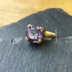 "Most Welcome to \"TheJewelryArts\" Products Description Center Stone: Genuine Lab-Grown Alexandrite Center Stone Size: 8x8mm Stone Shape: Cushion Cut Stone Clarity: VVS Material: 92.5 Sterling Silver, also available in 24k Rose Gold Vermeil/Gold Vermeil/Black Vermeil Stamp: 92.5 ➽Alexandrite changes under different lighting conditions. If viewed in daylight, its color is purple. If viewed in incandescent or candle light, its color is pink. This Alexandrite changes to blue/purple under sunlight. ➽OCCASION: Surprise your loved one with this beautiful engagement/wedding jewelry by TheJewelryArts . A classic piece of jewelry for all men/women in your life, this is a perfect gift for any occasion such as birthdays, anniversaries, wedding, engagements, Valentine's Day or Christmas day mother's Alexandrite Jewelry, June Birthstone Ring, Alexandrite Stone, Engagement Rings Cushion, Alexandrite Engagement Ring, Cushion Cut Engagement Ring, Alexandrite Ring, Bleu Violet, Candle Light