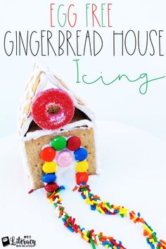 an egg free gingerbread house is decorated with colorful sprinkles and candy