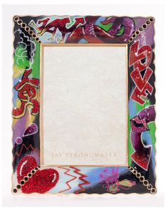 an artistic photo frame with hearts and words on it's sides, in the shape of a heart