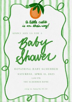 a baby shower is shown with an orange on the front and green stripes in the background