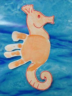 a drawing of a sea horse on a blue background