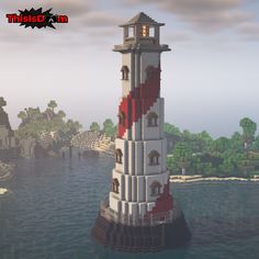 a large white and red lighthouse sitting on top of a body of water