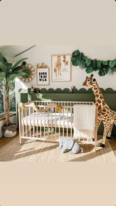 a giraffe standing next to a baby crib