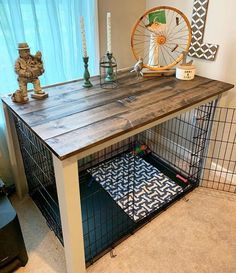 a dog crate under a table in a living room