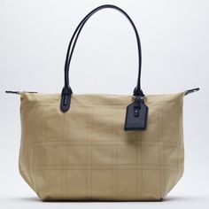 Nwt. Zara Beige Topstitching Nylon Traveling Bag. Height X Length X Width: 11,5 X 17 X 7 Inches. Ref. 6141/710. Canvas Weekender Bag, Traveling Bag, Suede Tote Bag, Zara Bags, Embroidered Tote, Travel Handbags, Nylon Tote Bags, White Tote, Jute Bags