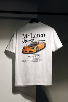 🏁 Rev up your style with FirstGears' McLaren F1 Vintage T-shirt. Made from comfortable 100% cotton, this shirt is a nod to Formula 1 excellence. The front proudly displays the McLaren Formula 1 Team logo and the words "McLaren Formula 1 Team" - a sleek tribute to racing greatness. Flip the shirt, and you'll find an Orange McLaren F1 on the back, accompanied by the text "McLaren Racing" - a simple yet powerful celebration of this legendary car's racing prowess. 🌎 SHIPPING As these shirts are ha Casual Short Sleeve T-shirt For Motorsport Events, White Racing Style T-shirt With Graphic Print, White Cotton Racing T-shirt, White T-shirt With Motorsport Letter Print, White Letter Print T-shirt For Motorsport Events, Racing Style Cotton T-shirt With Letter Print, Casual White Tops For Motorsport Events, Racing Style Letter Print T-shirt For Motorsport Events, Racing Style T-shirt With Letter Print For Motorsport Events