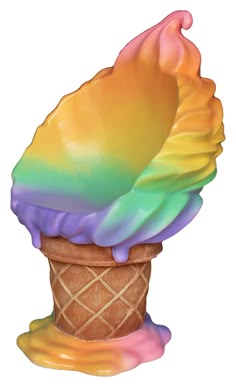 an ice cream cone with multicolored icing