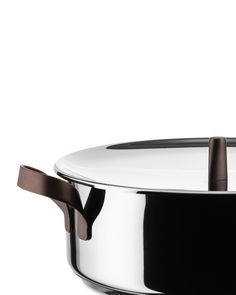 a large stainless steel pot on a white background with a brown handle and two black handles