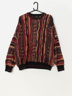 90s vintage coogi style sweater by J Ferrar. This autumnal coloured 1990s coogi style sweater by J Ferrar features a crew neck, long sleeves and is made from a heavyweight, soft cotton blend with a relaxed fit. Our recommended size: Large Label says: Large Condition: Very good Material: 52% cotton, 48% acrylic Measurements in inches: Pit to pit: 22 Shoulders: 24 Front length: 26 Back length: 27 Sleeve length: 21.5 Hem (unstretched): 15 Hem (stretched): 17 We recommend that you compare our measur Patterned Long Sleeve Shirt, 90s Crew Neck Sweater With Fair Isle Pattern, 90s Style Fair Isle Pattern Crew Neck Sweater, 90s Fair Isle Pattern Crew Neck Sweater, 90s Fair Isle Crew Neck Sweater, 90s Style Long Sleeve Fall Sweater, 90s Brown Long Sleeve Sweater, 90s Style Fall Sweater For Streetwear, 90s Fall Streetwear Sweater