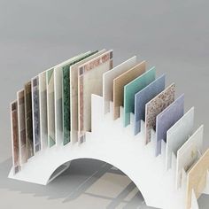 a bridge made out of different types of tiles and papers on top of each other