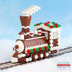 a lego train is shown in the snow