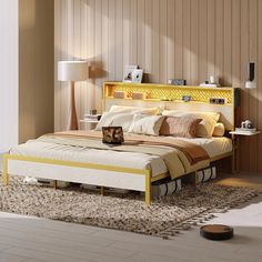 a bedroom with a bed, nightstands and rug on the floor in front of it