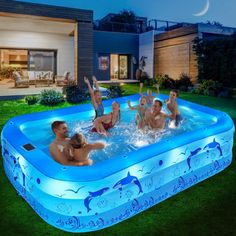 an inflatable swimming pool with several people sitting around it