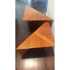 three wooden shelves stacked on top of each other