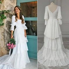 a woman in a white dress standing next to a mannequin wearing a wedding gown