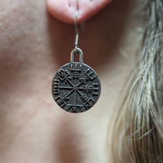 Vegvisir bronze earrings Embrace the mystique of ancient Norse mythology with our Vegvisir Earrings, inspired by the legendary Viking compass. Crafted with meticulous attention to detail, these earrings capture the essence of Norse symbolism and pagan tradition.The Vegvisir, also known as the Viking compass, is a powerful symbol of guidance and protection. Believed to lead travelers safely through rough seas and unknown lands, it embodies the spirit of adventure and exploration.Made from solid b Vegvisir Symbol, Viking Accessories, Greek Mythology Jewelry, Mythology Jewelry, Ancient Runes, Mjolnir Pendant, Rough Seas, Norse Jewelry, Norse Pagan