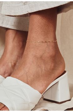 Elevate your everyday looks with a delicate chain anklet playfully punctuated with flattened links for a subtle dimensional twist. 9 1/4" length 14k-gold fill Made in the USA Anklet Designs, Gold Anklet, Delicate Chain, Chain Anklet, Anklet Jewelry, Pure Gold, Pretty Jewellery, Cute Jewelry, Everyday Look