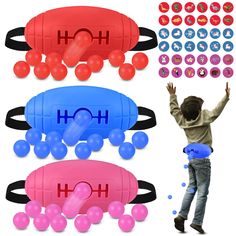 a man standing in front of three different colored balls and an object with the word hoo on it