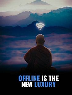 a man sitting in front of a mountain with the words offline is the new luxury